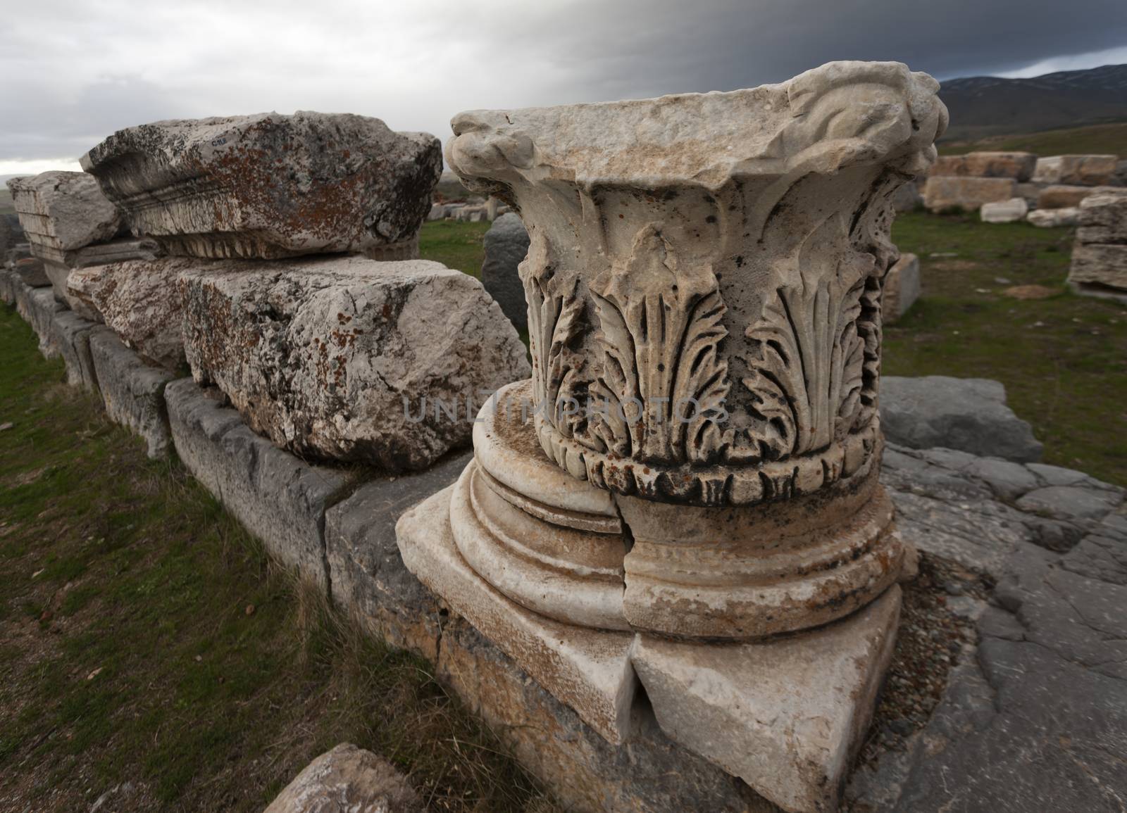 Remains of base and cap from Corinthian style column at Antioch Pisidian in Turkey