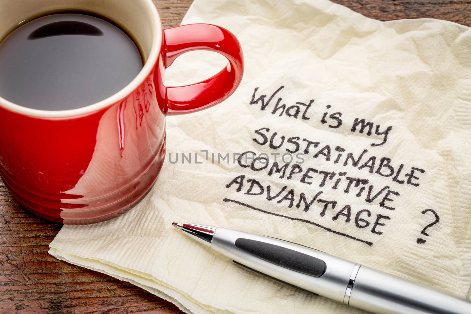 What is my sustainable competitive advantage question - handwriting on a napkin with a cup of coffee