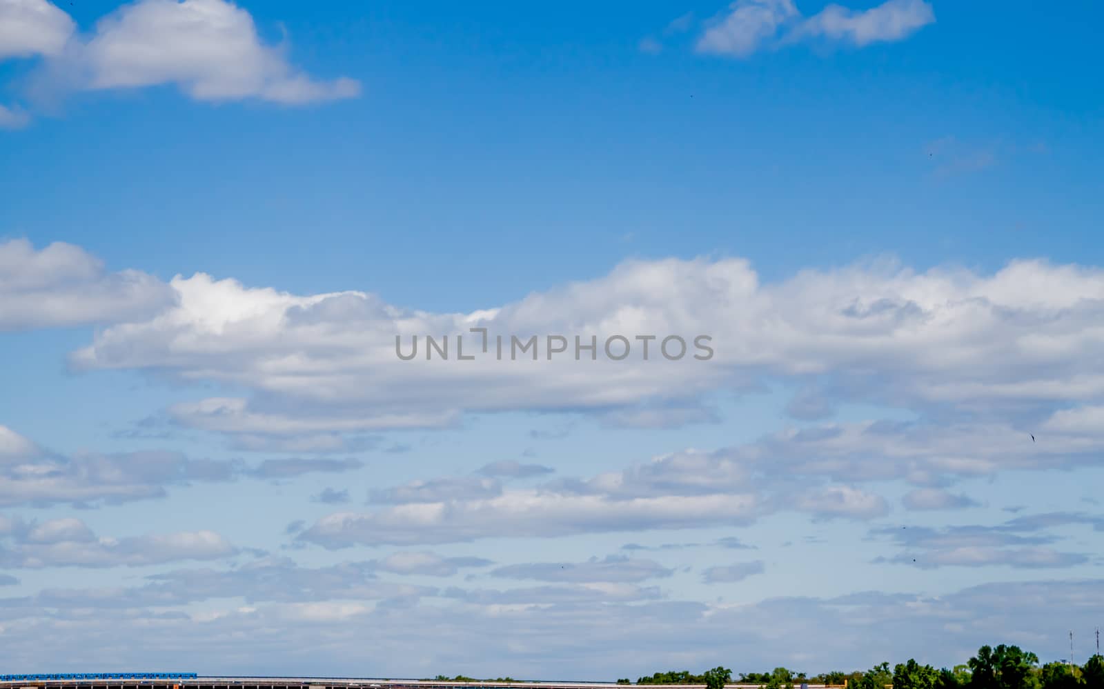 blue sky over river by Chechotkin