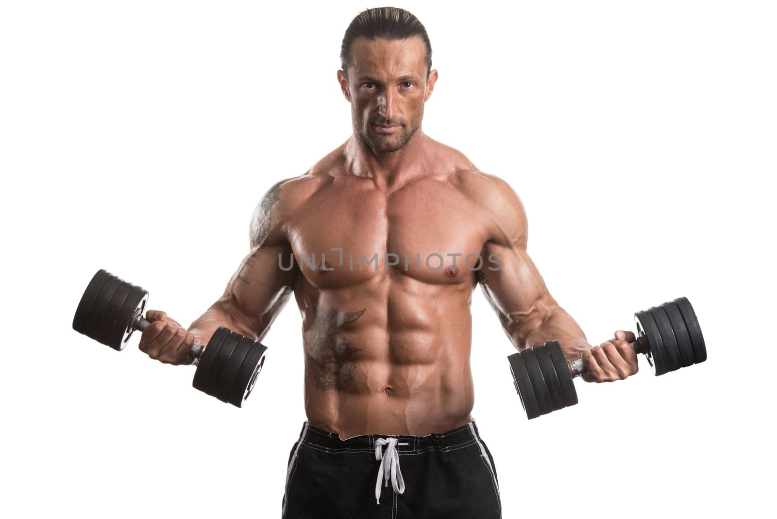 Man Working Out With Dumbbells On White Background by JalePhoto