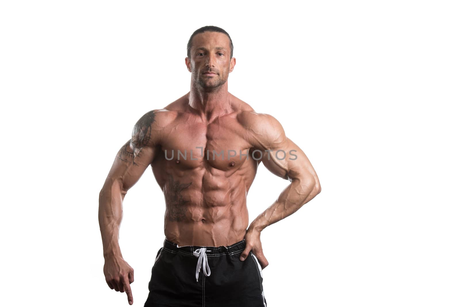 Muscular Bodybuilder Man Posing Over White Background by JalePhoto