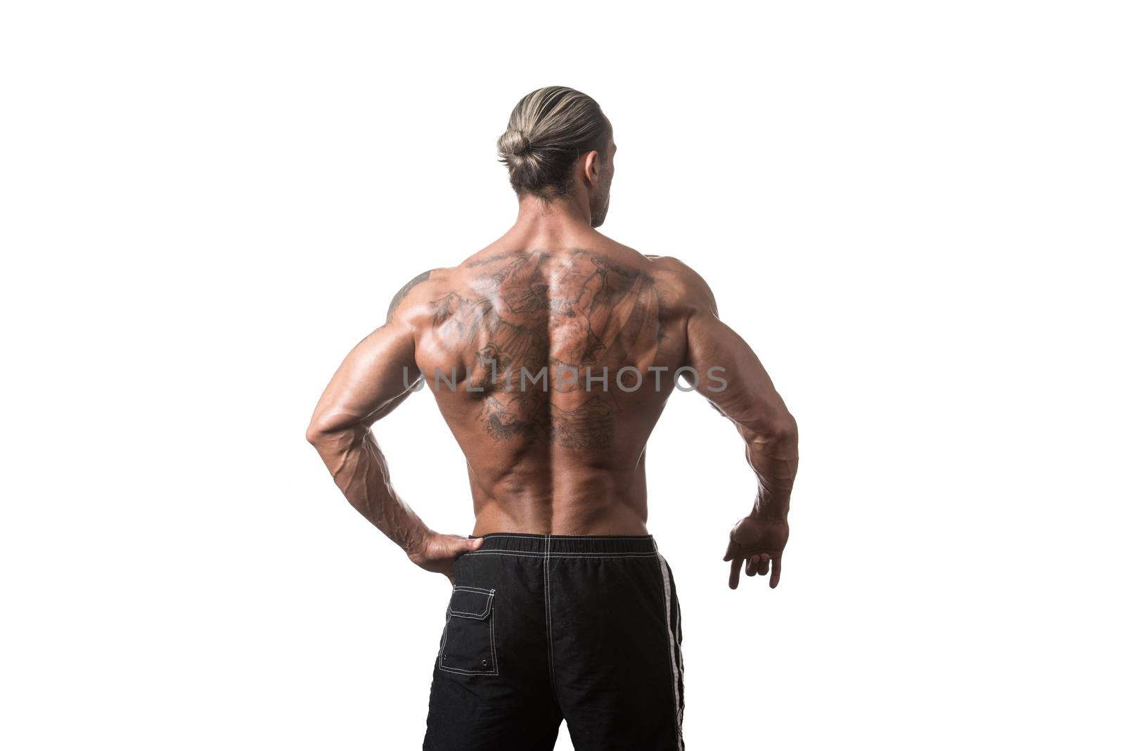Rear View Of Back Tattooed Man by JalePhoto