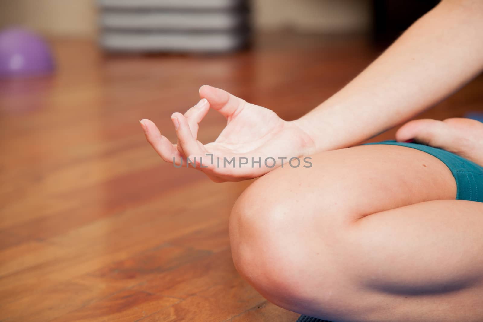 Woman meditating in yoga