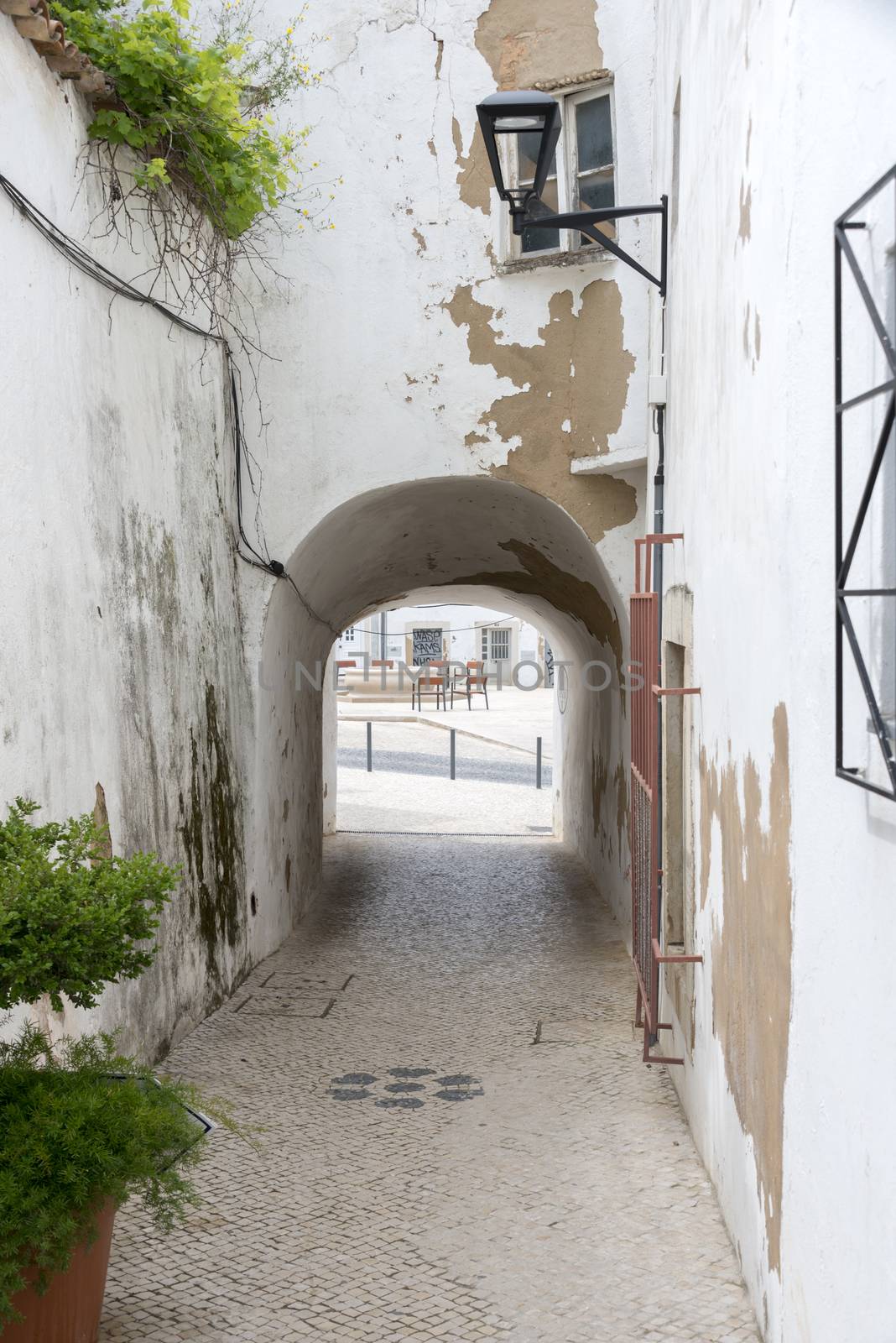 old street with view  on square  in Lagos Portugal