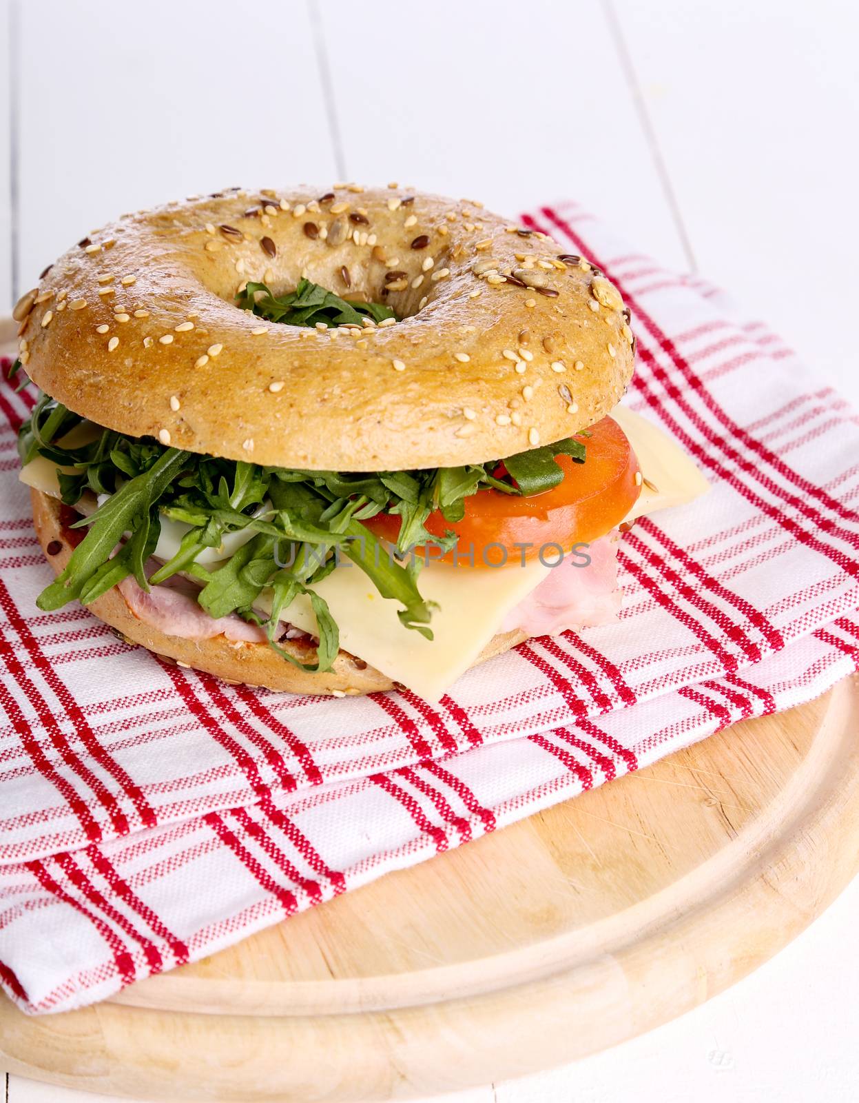 Delicious bagel sandwich on the table