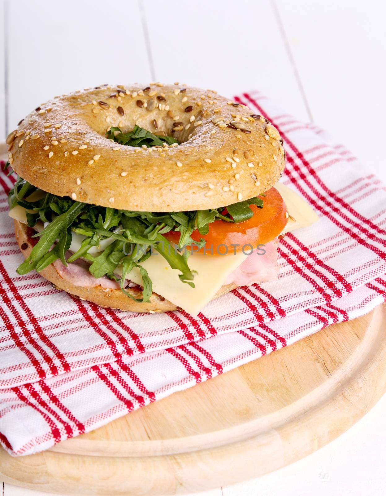 Delicious bagel sandwich on the table