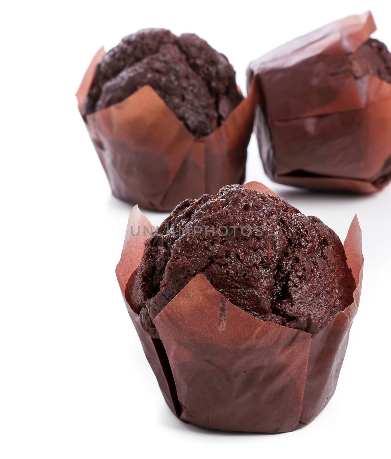 Delicious muffin on a white background