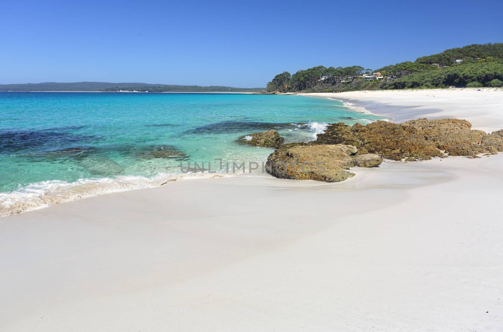 Beautiful crystal clear waters and white sands of Chinamans Beach, Jervis Bay Australia.   With space for copy