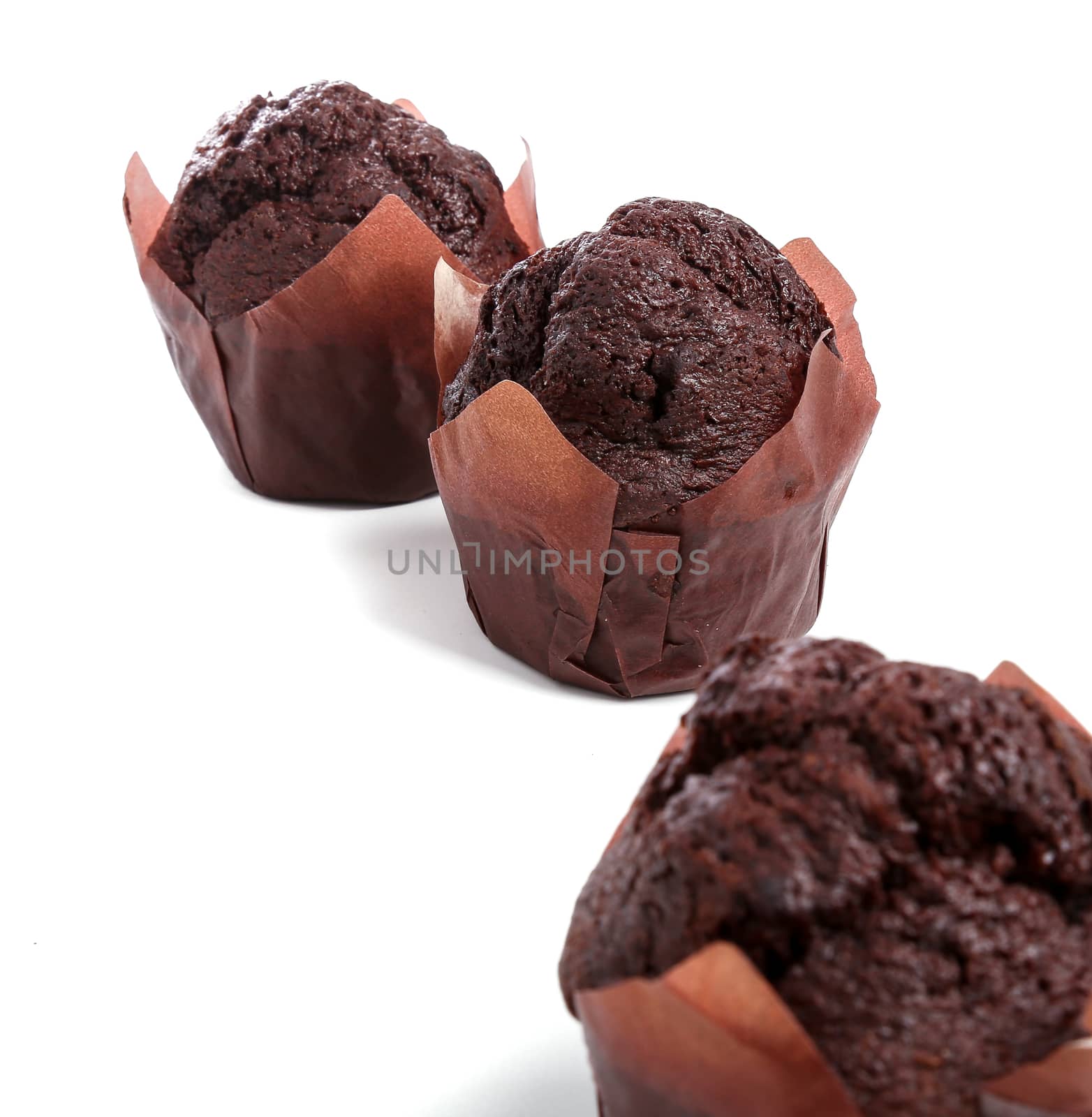 Delicious muffin on a white background