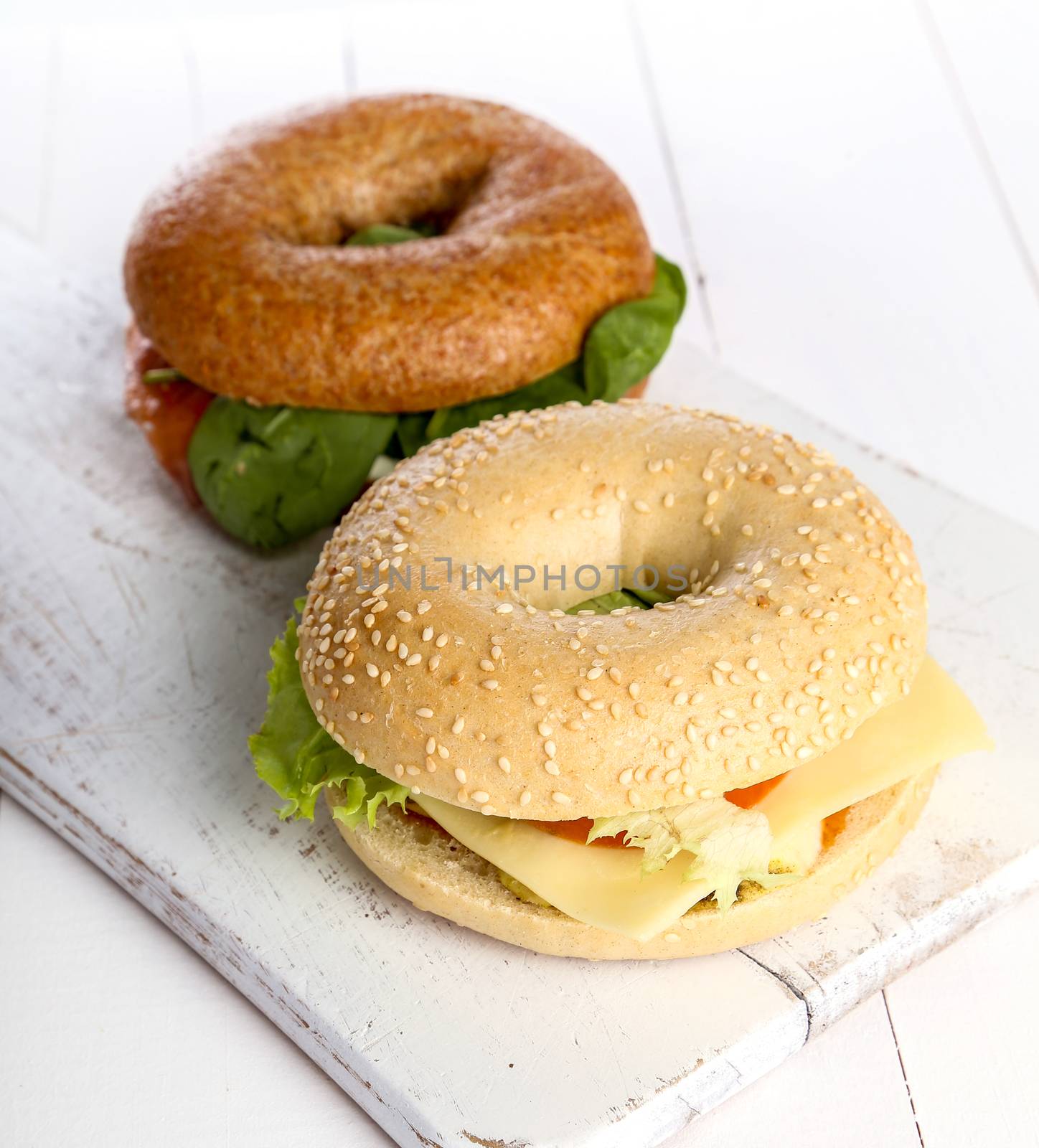 Delicious bagel sandwich on the table