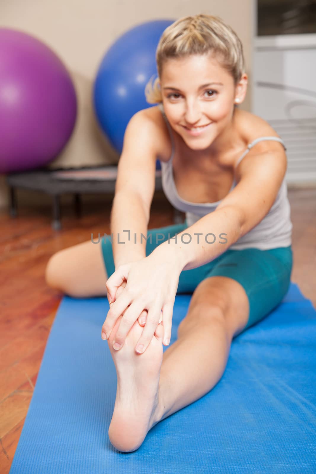 Woman stretching her foot