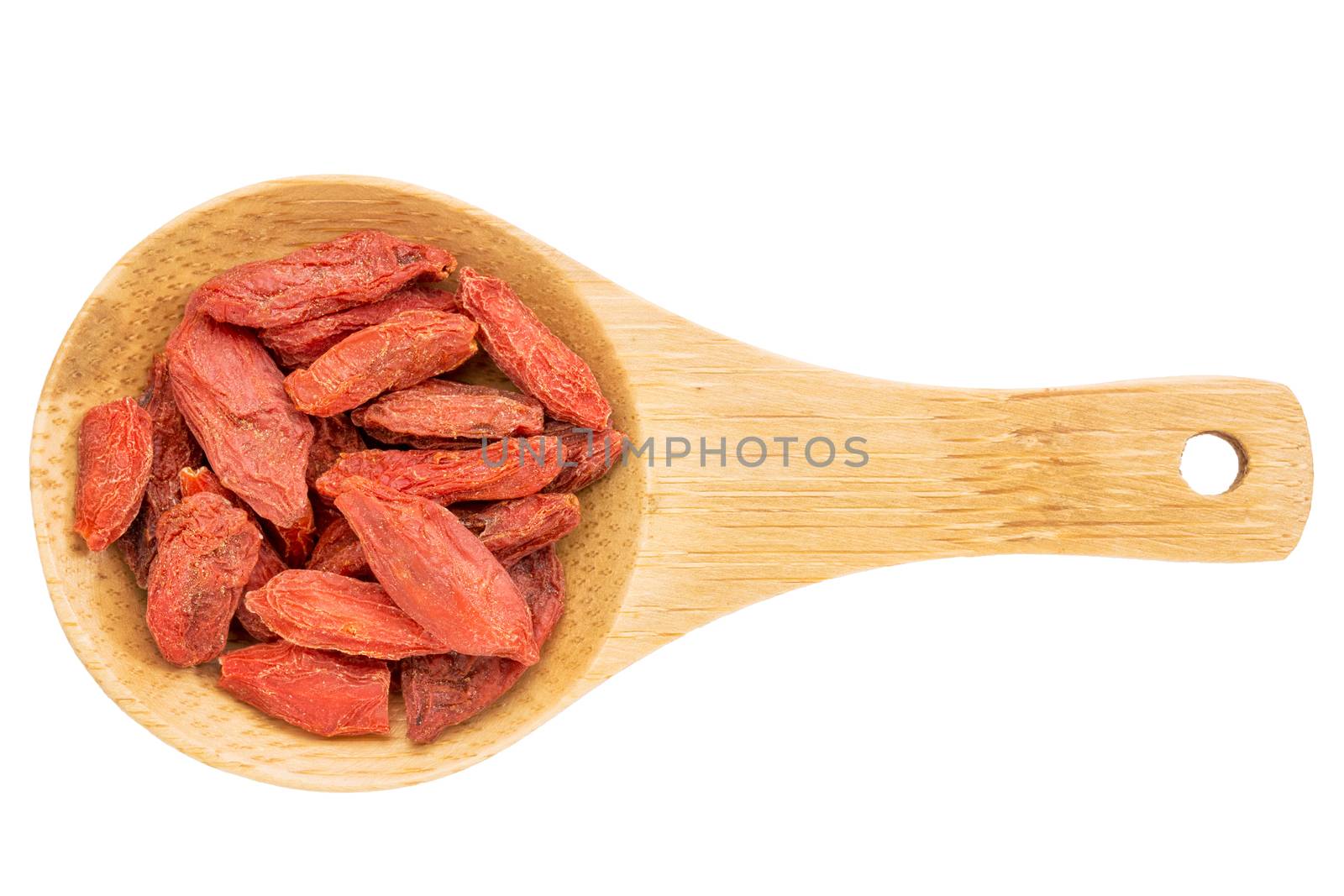 on a small wooden spoon isolated on white with a clipping path