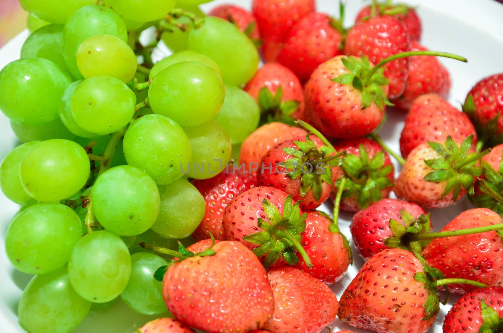 Fresh strawberries and grapes