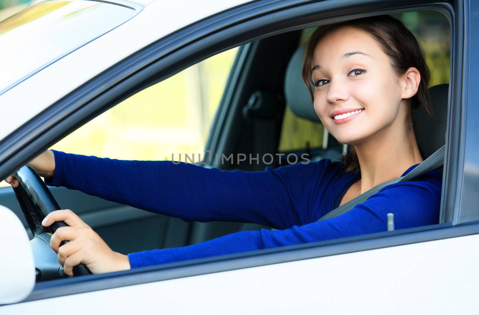 Pretty girl in a car