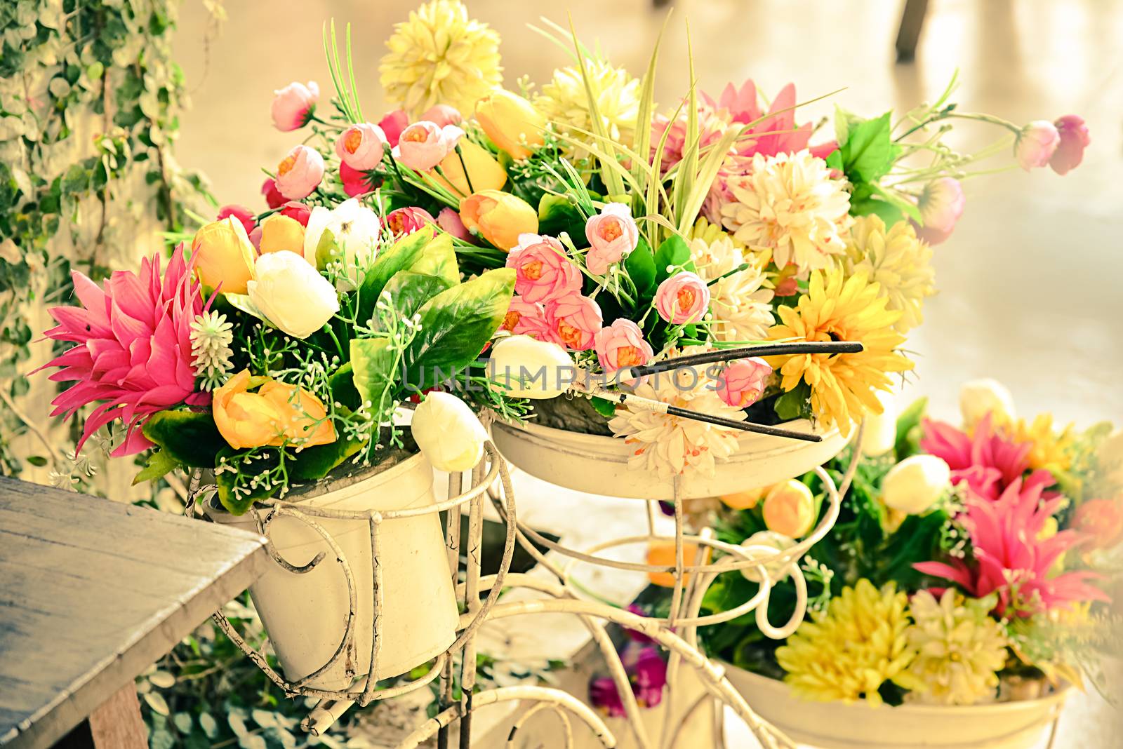 Decoration artificial flower in basket on bicycle