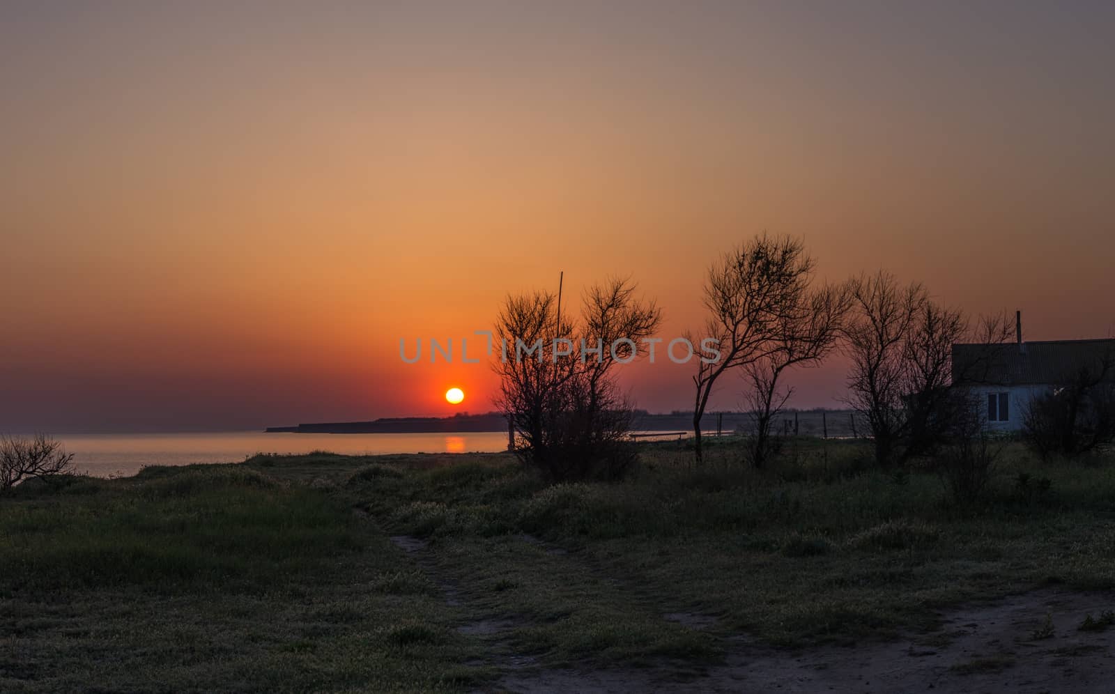 landscape, depicting the sea sunrise at the old lighthouse