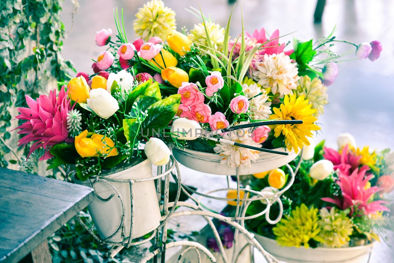 Decoration artificial flower in basket on bicycle