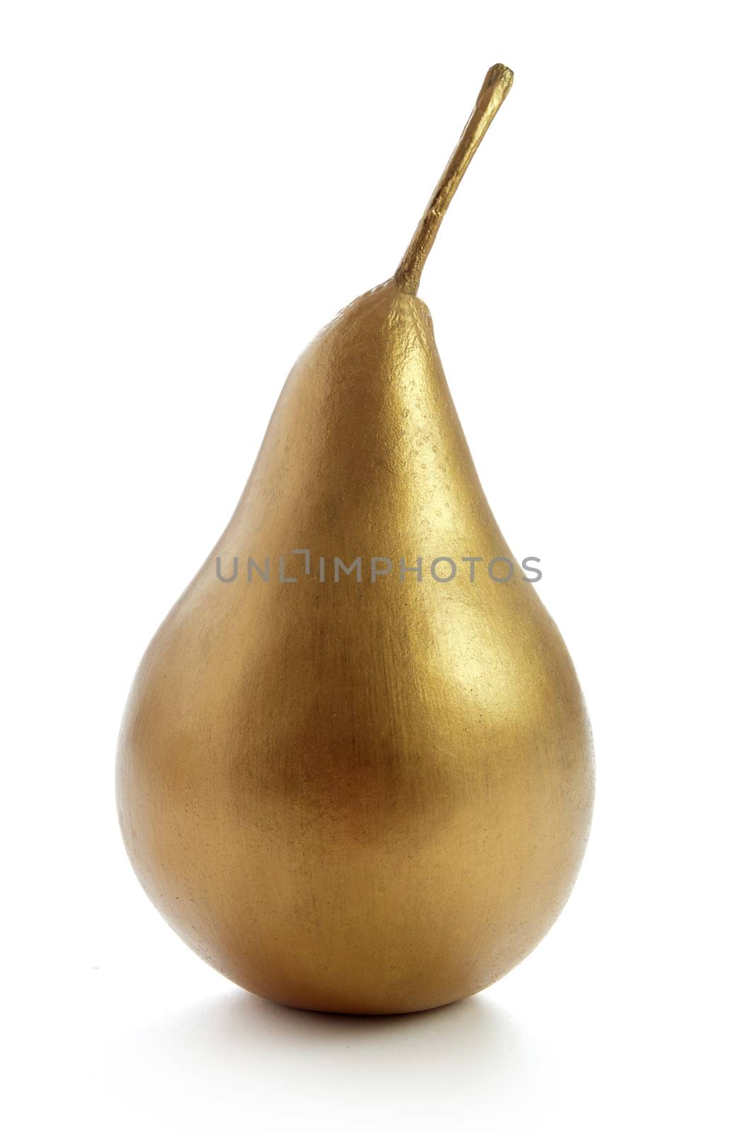 Gold pear standing over a white background