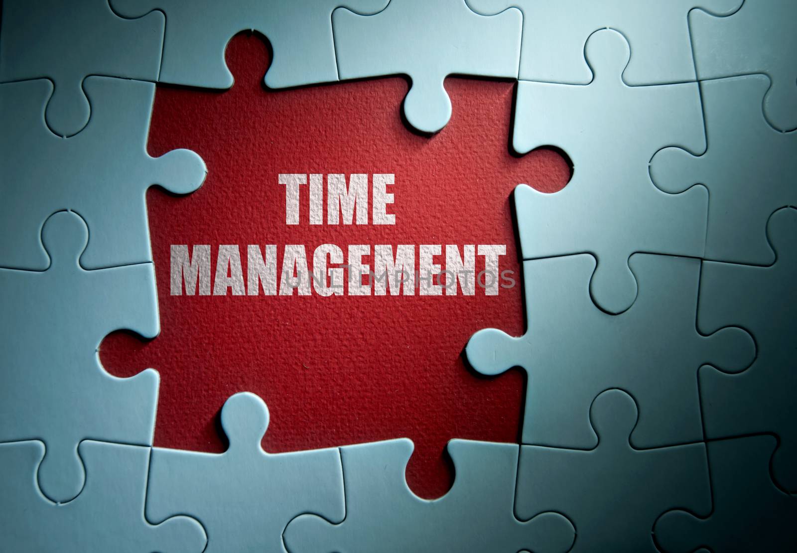Missing pieces from a jigsaw puzzle revealing time management