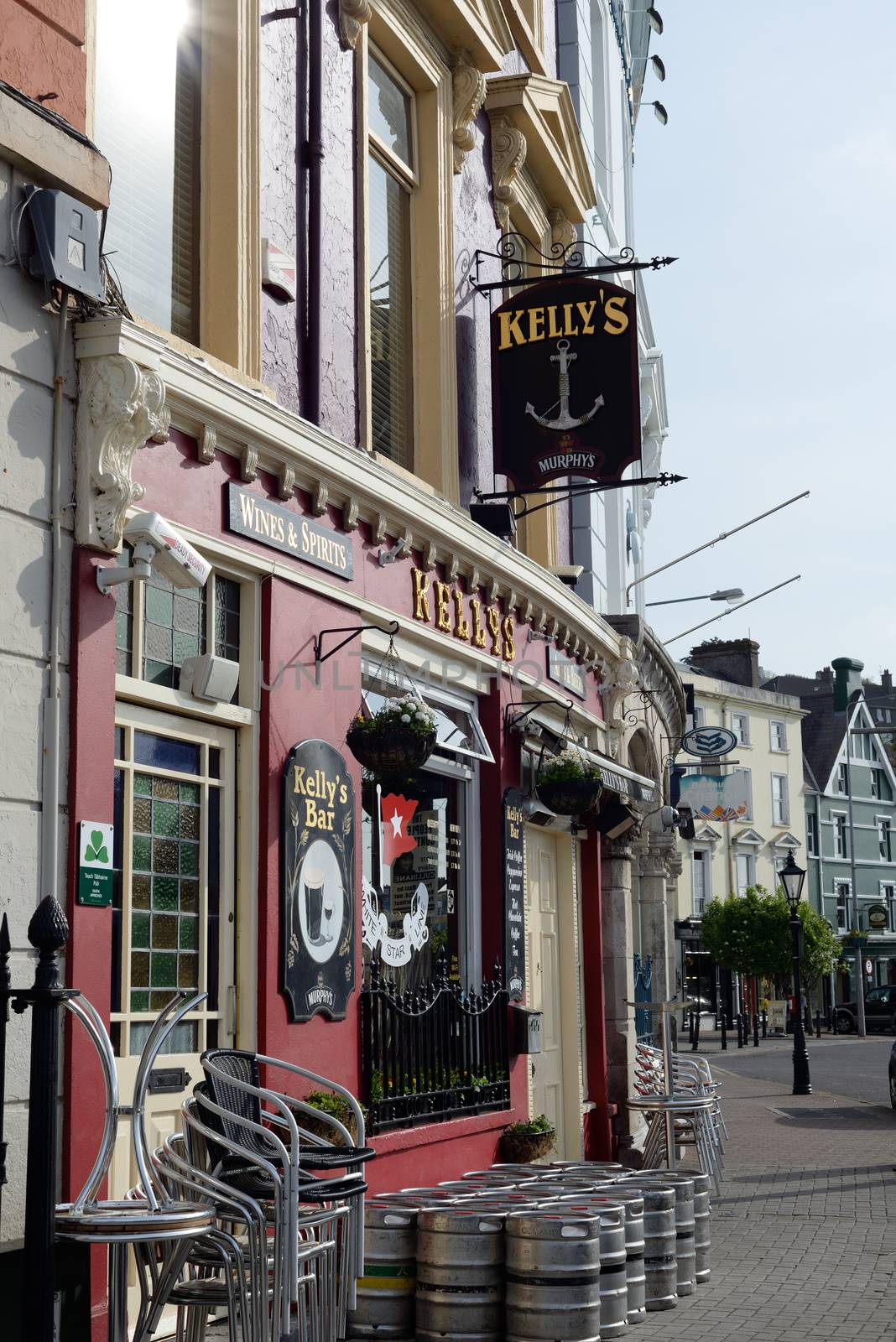 barrels and chairs in front of kellys bar by morrbyte