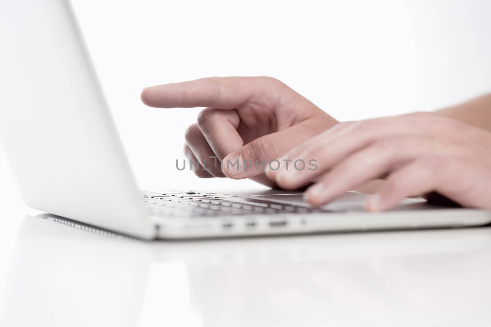 Closeup of Fingers Using Keyboard by courtyardpix
