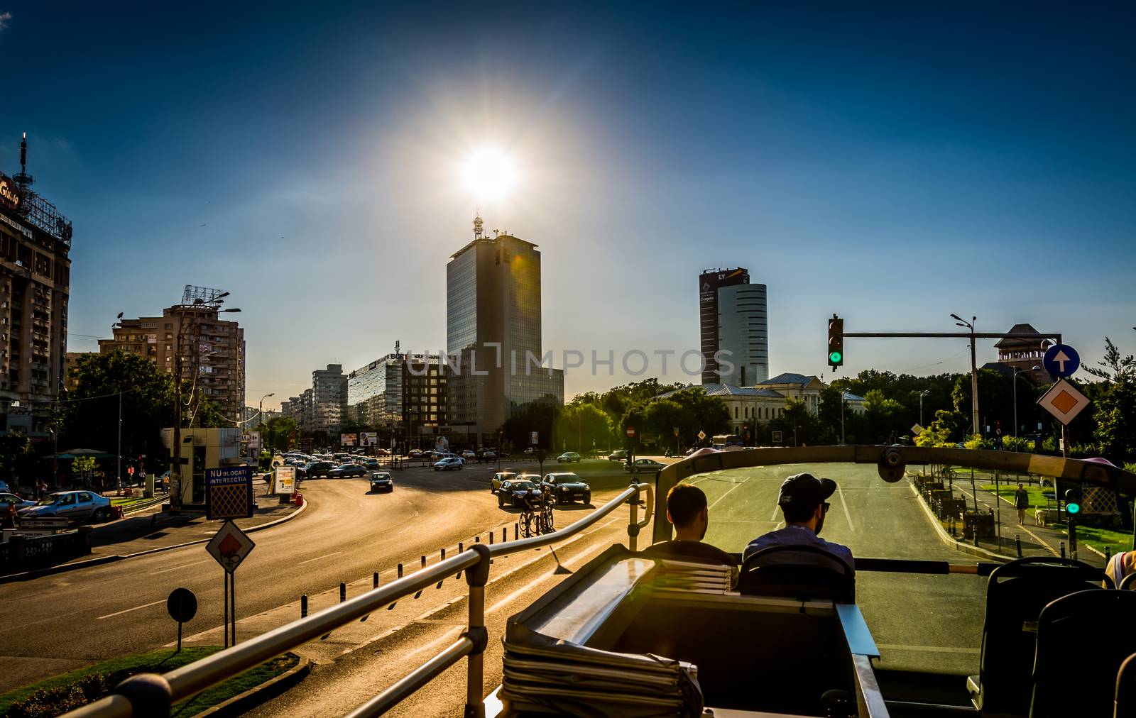 Victoria Square (Piata Victoriei) in Bucharest, Romania seen from convertible city bus.