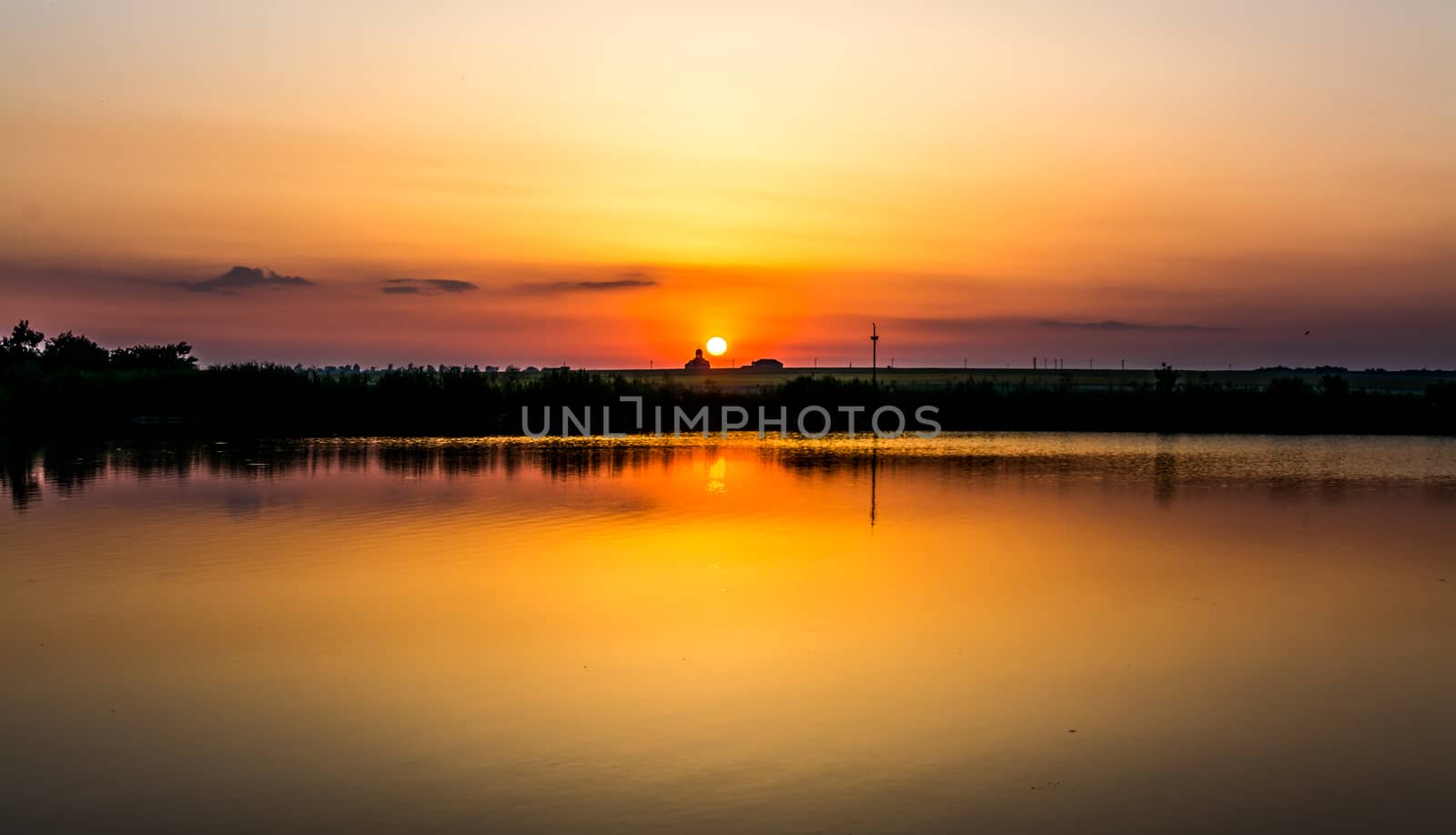 Sunset on Mamaia Lake in Constanta, Romania.