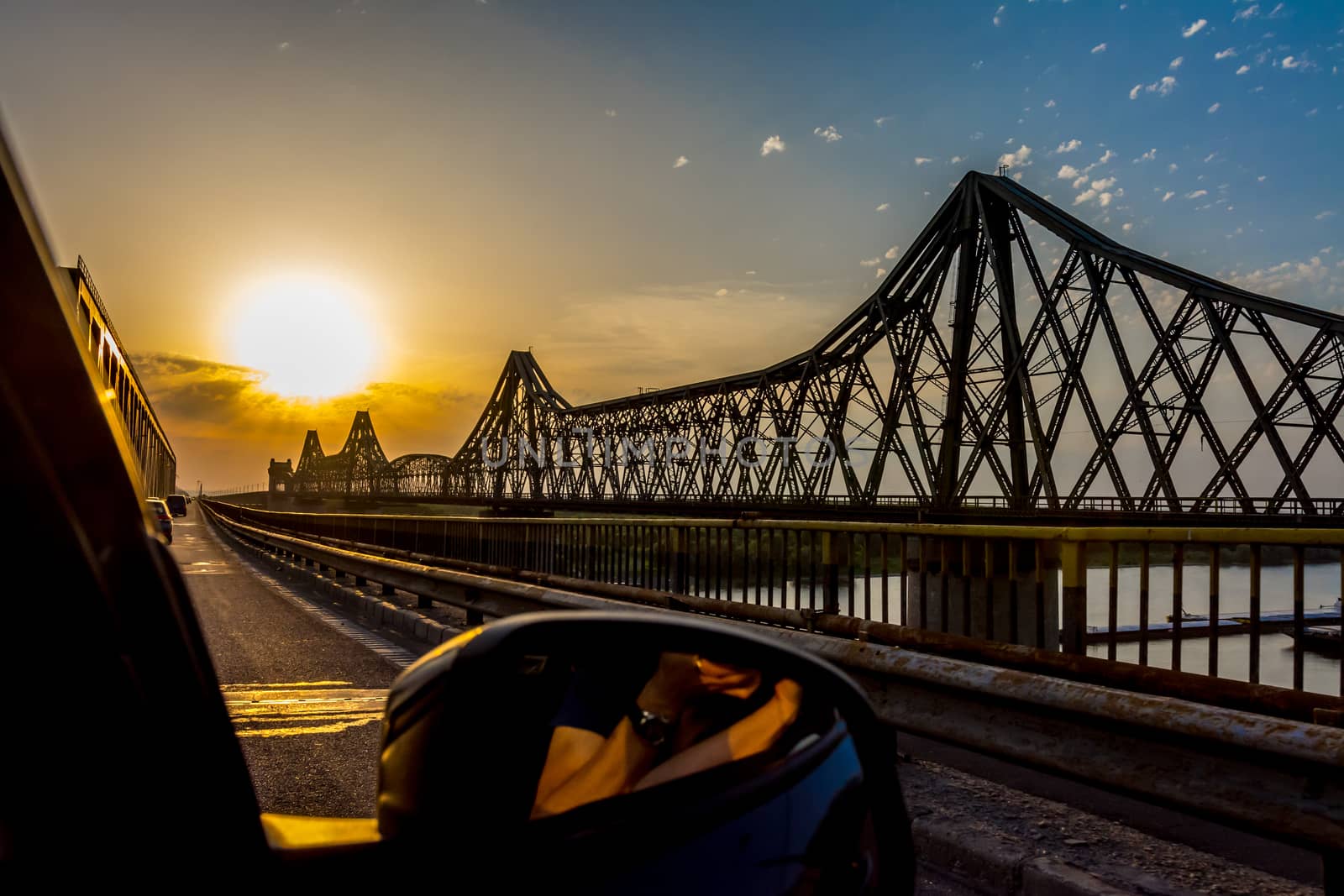 Orange sunset on Anghel Saligny Bridge, Romania.