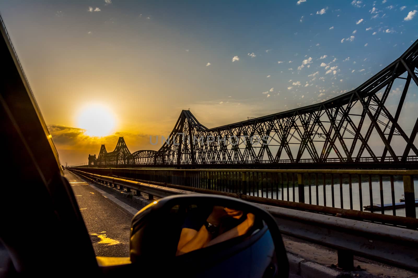 Orange sunset on Anghel Saligny Bridge, Romania.