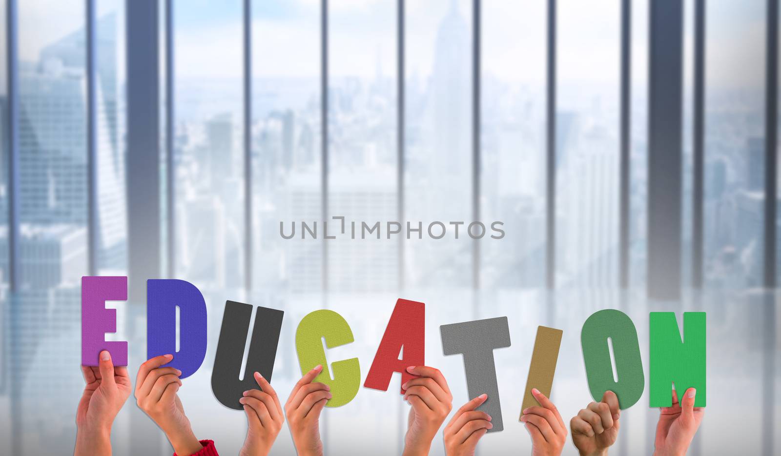 Composite image of hands showing education by Wavebreakmedia