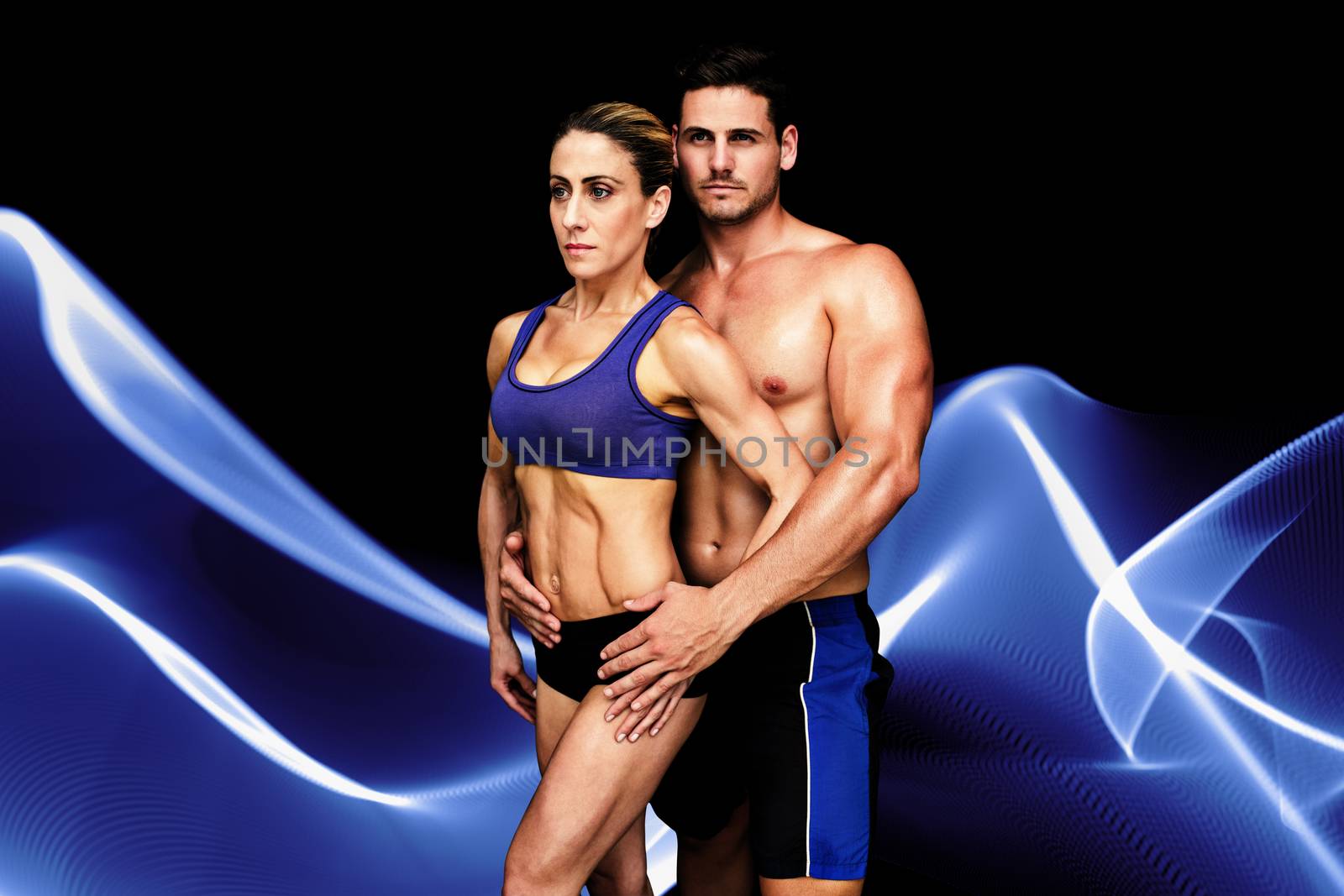 Composite image of bodybuilding couple by Wavebreakmedia