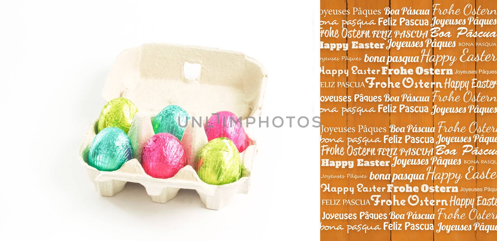 Happy easter in different languages against wooden planks