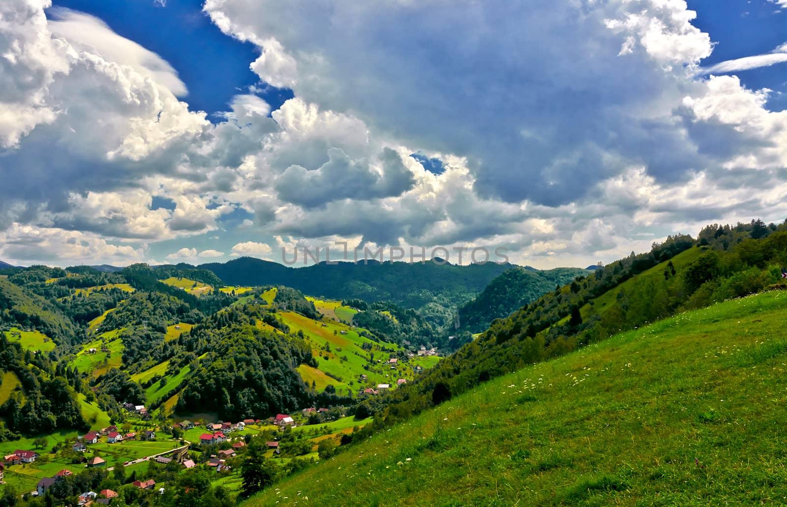 Landscape with Bucegi Mountains and Moeciu Village, Romania.