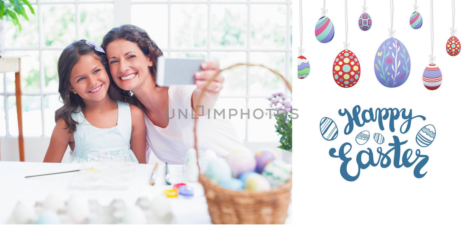 Happy mother and daughter taking selfie against happy easter graphic