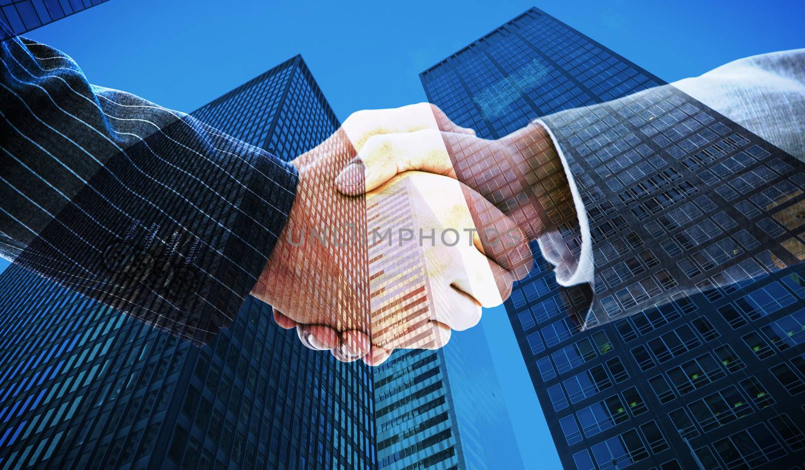 Composite image of business people shaking hands by Wavebreakmedia