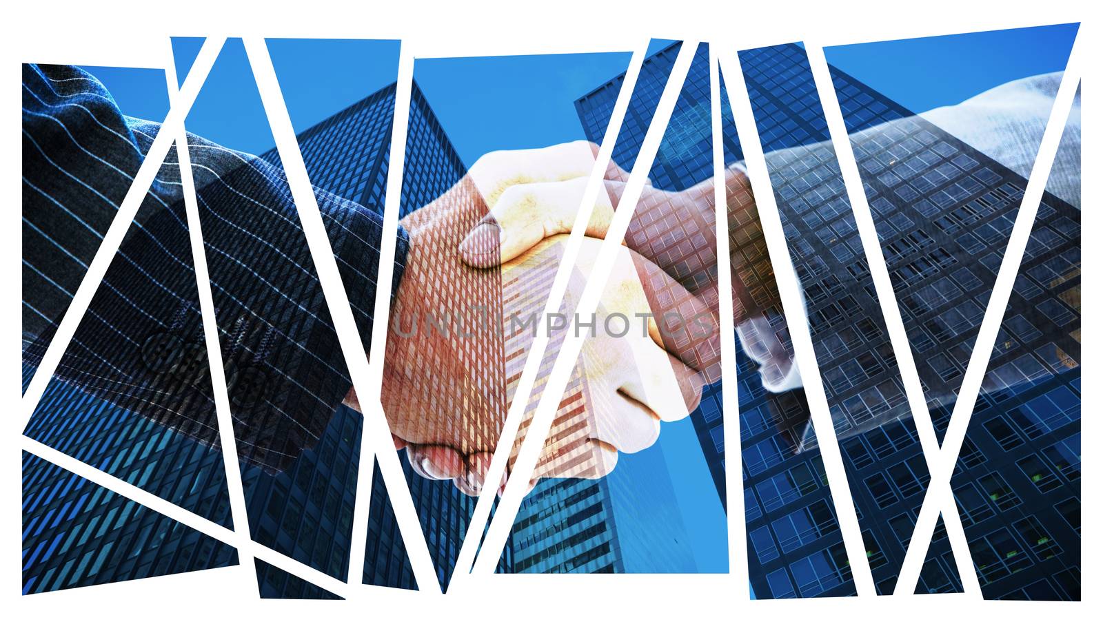 Business people shaking hands against skyscraper