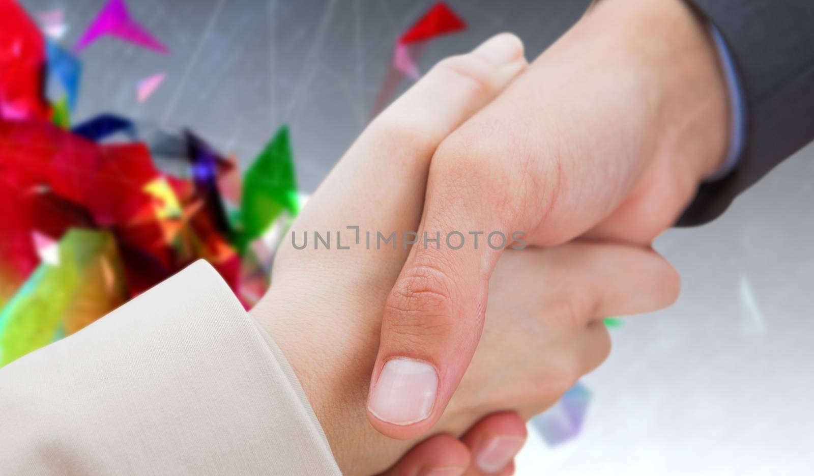 Composite image of close up on new partners shaking hands by Wavebreakmedia