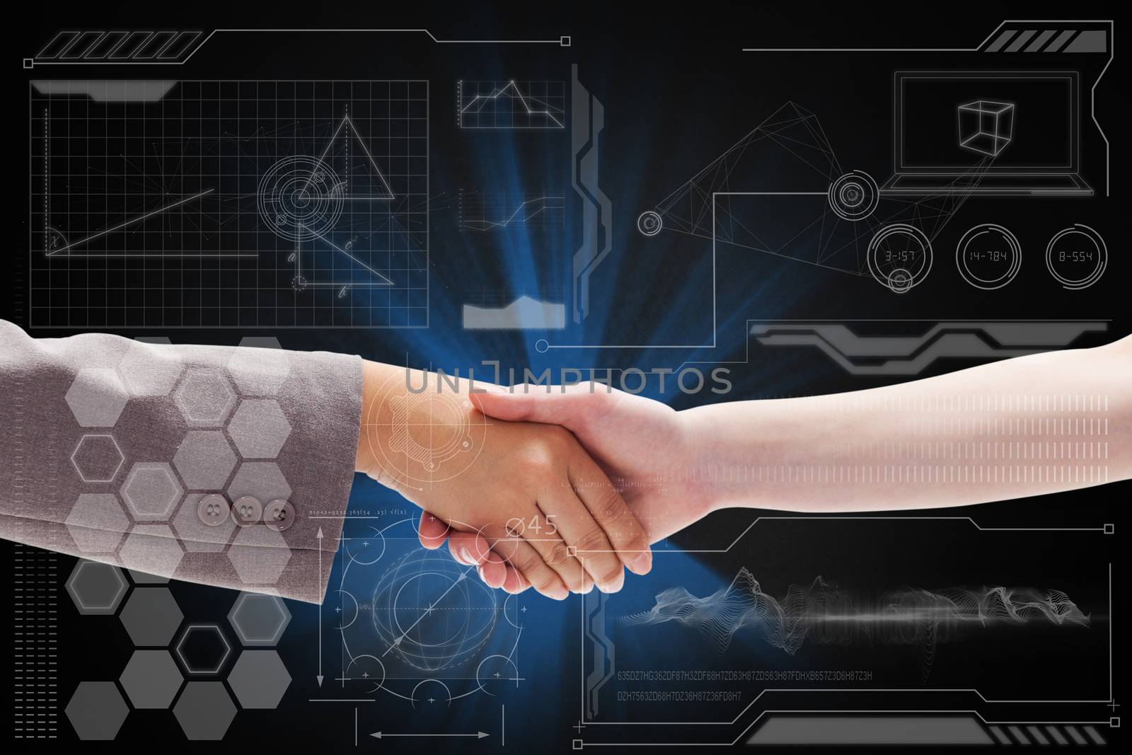 Handshake between two women against technology interface