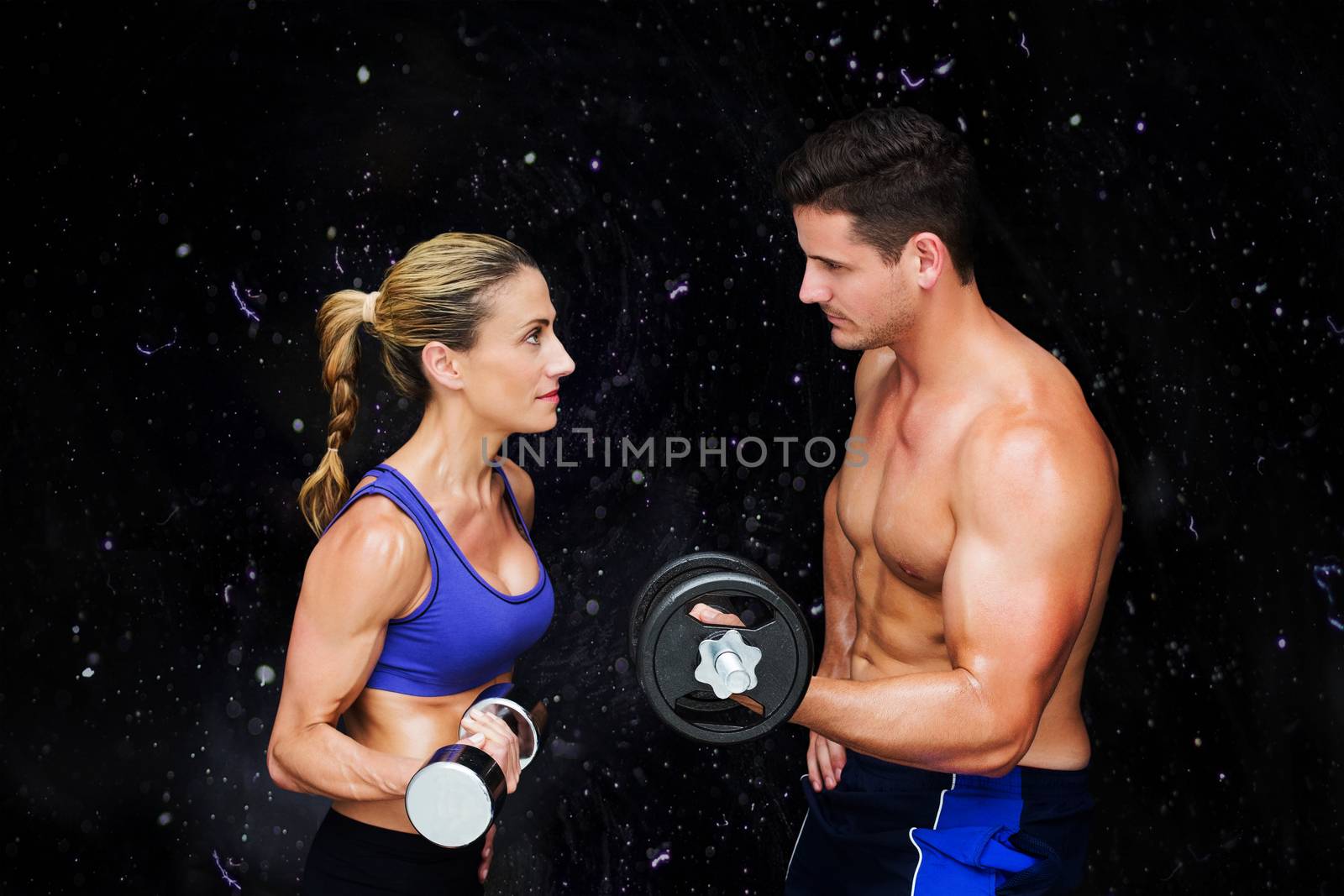 Bodybuilding couple against black background