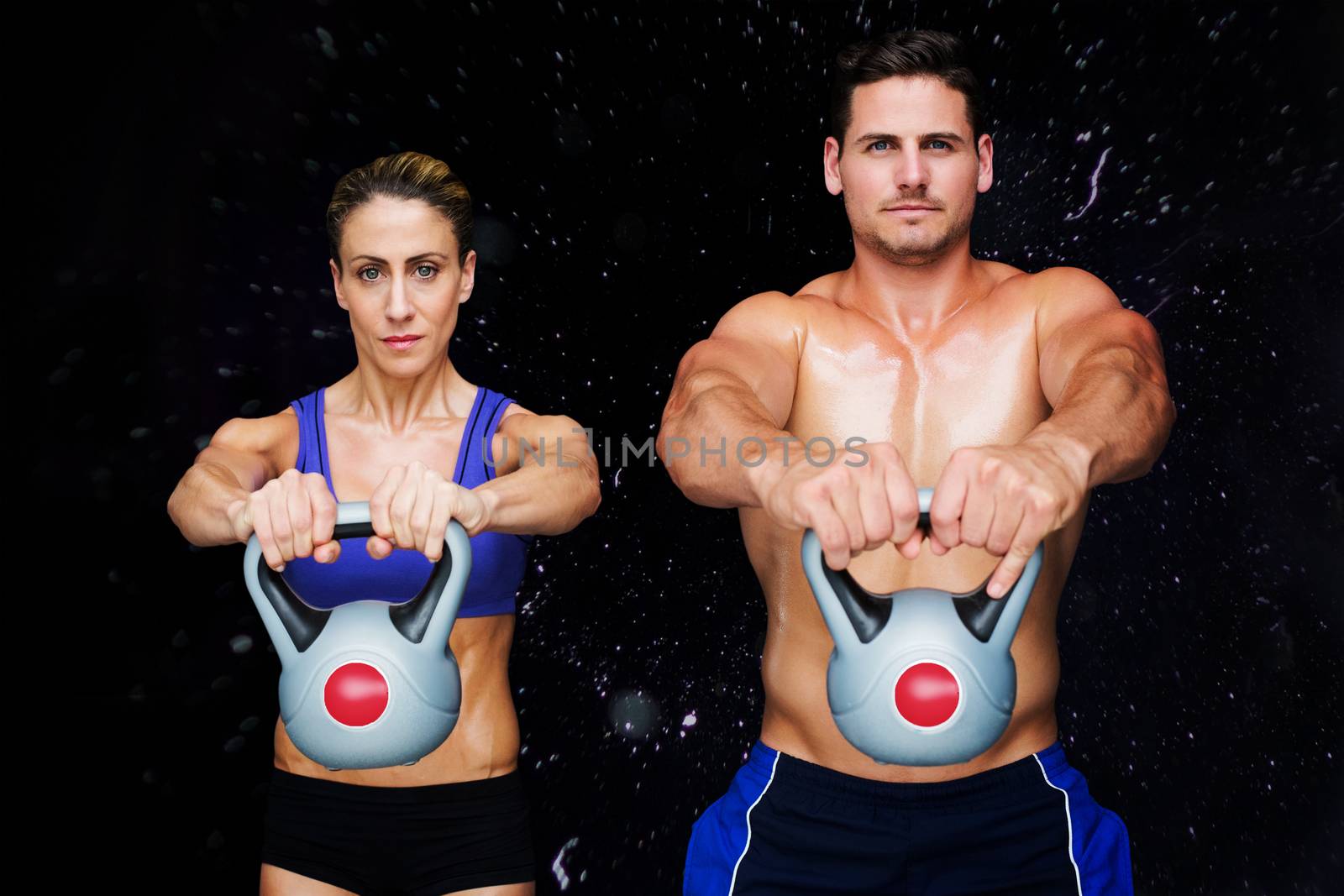 Bodybuilding couple against black background