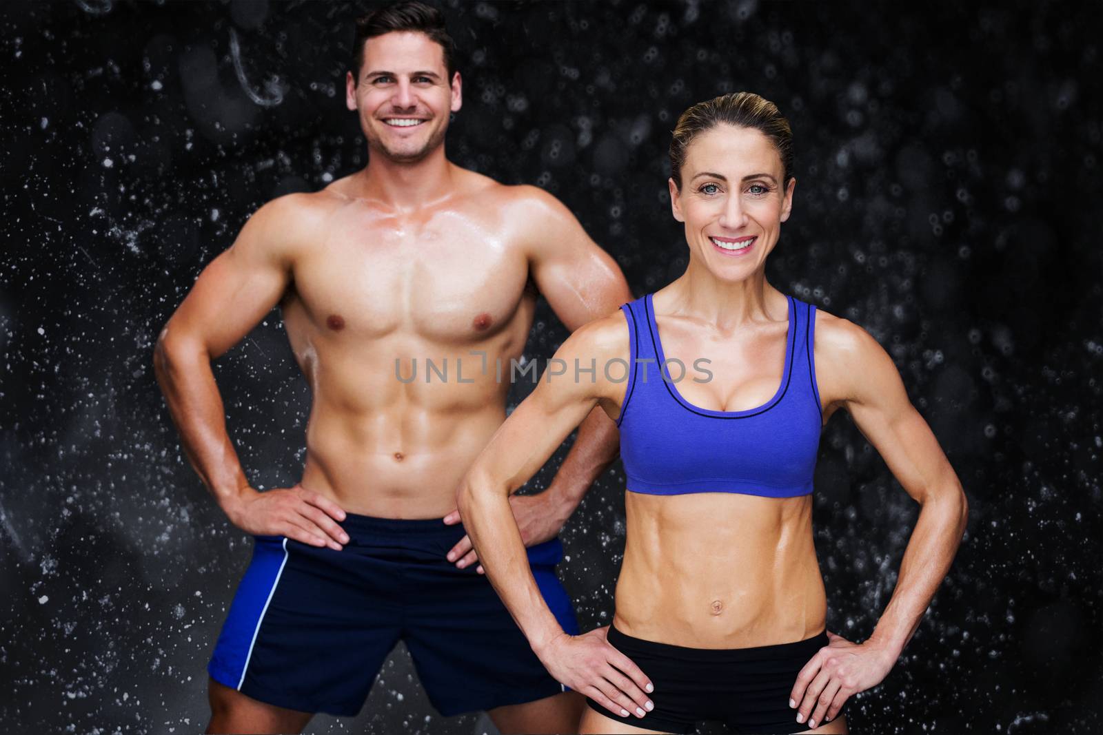 Composite image of bodybuilding couple by Wavebreakmedia