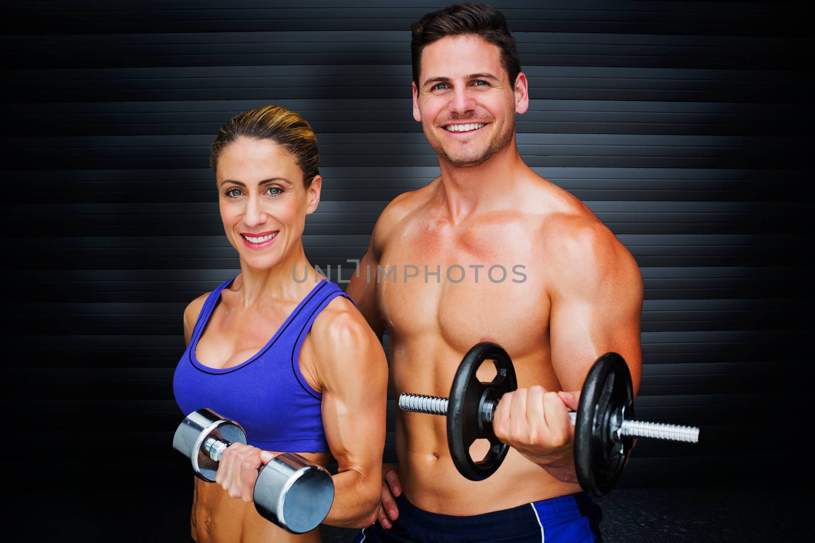 Bodybuilding couple against black background