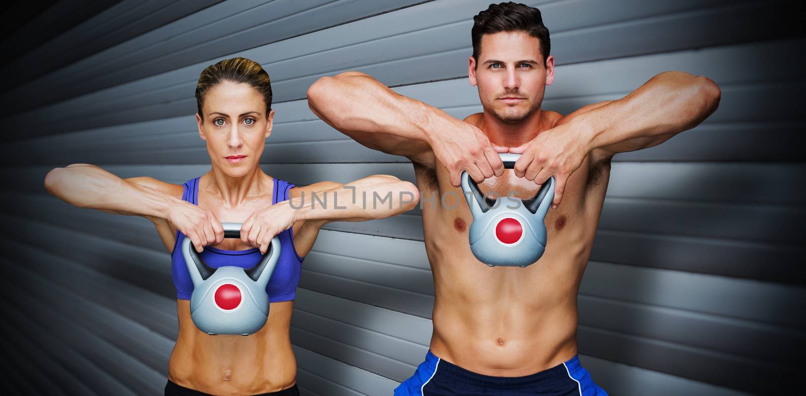 Bodybuilding couple against grey shutters