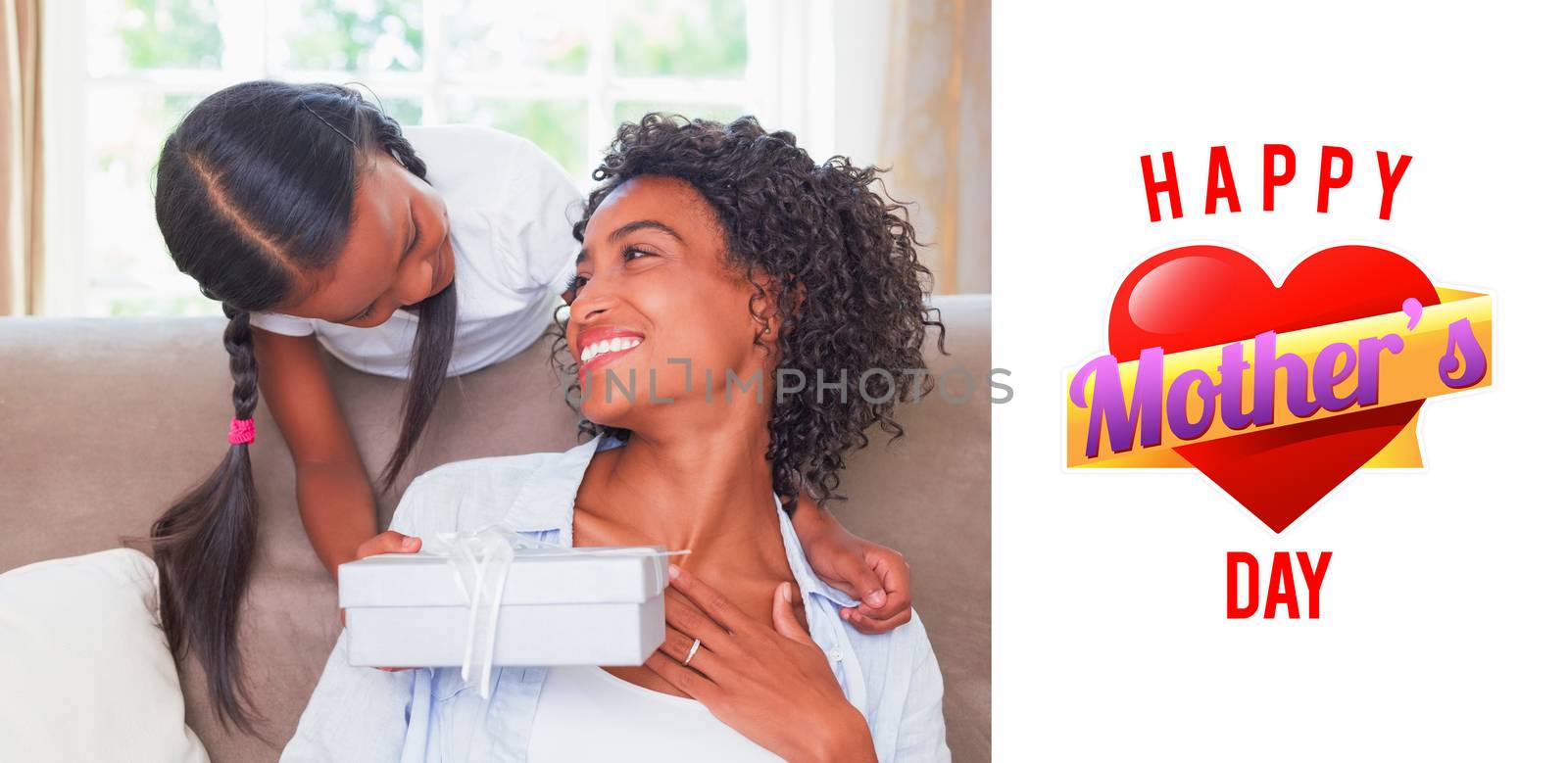 mothers heart against pretty mother sitting on couch with daughter offering a gift