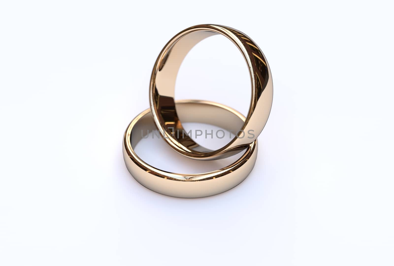 Couple of gold wedding rings on white background  by Barbraford