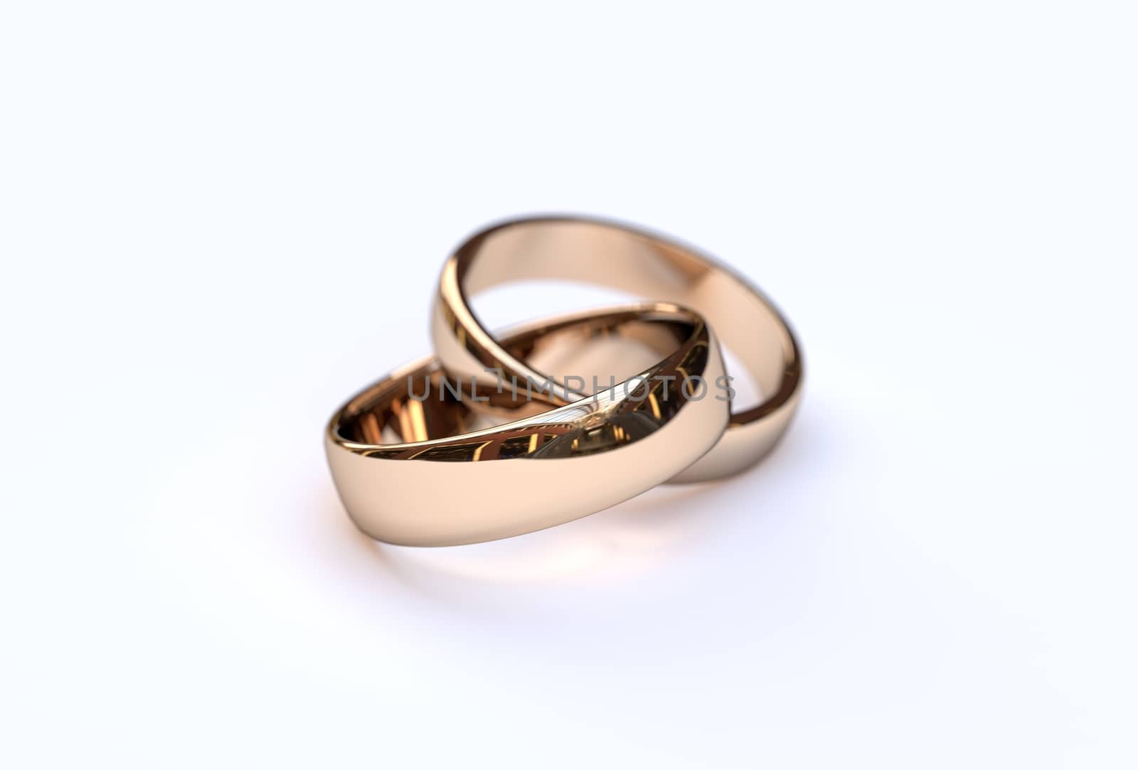 Golden wedding rings on white background, close up 