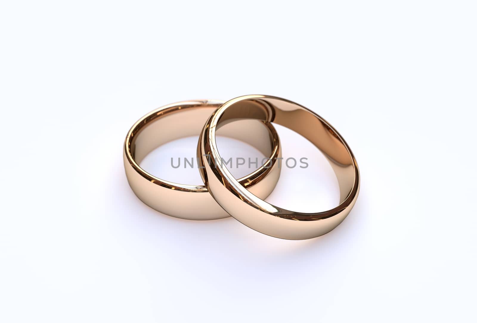 Couple of gold wedding rings on white background  by Barbraford