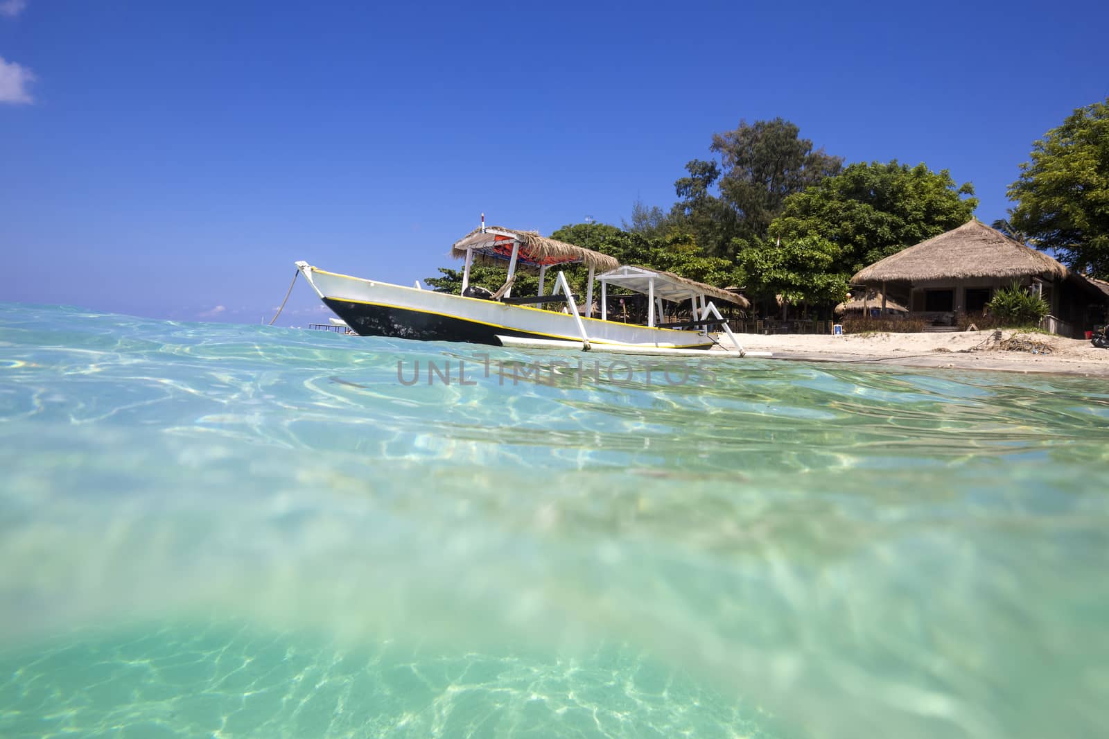 Long Tail Boat on Tropical Beach, Gili island, Bali.