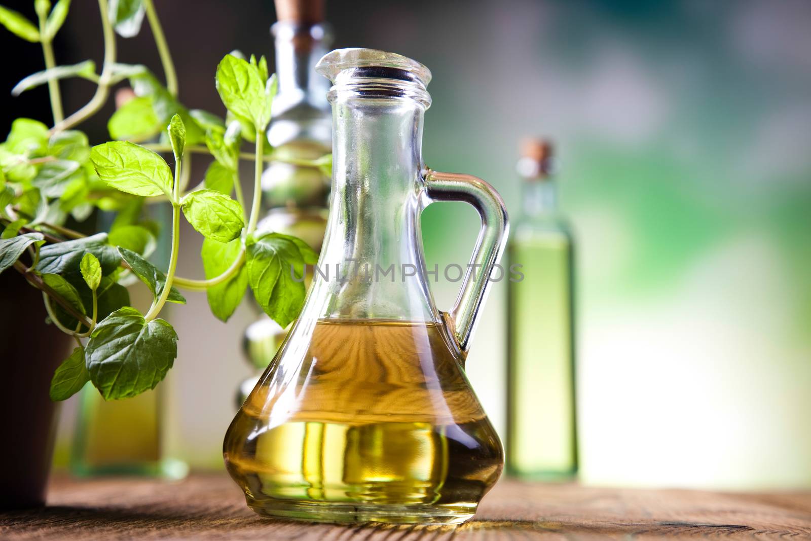 Olive oils in bottles, Mediterranean rural theme