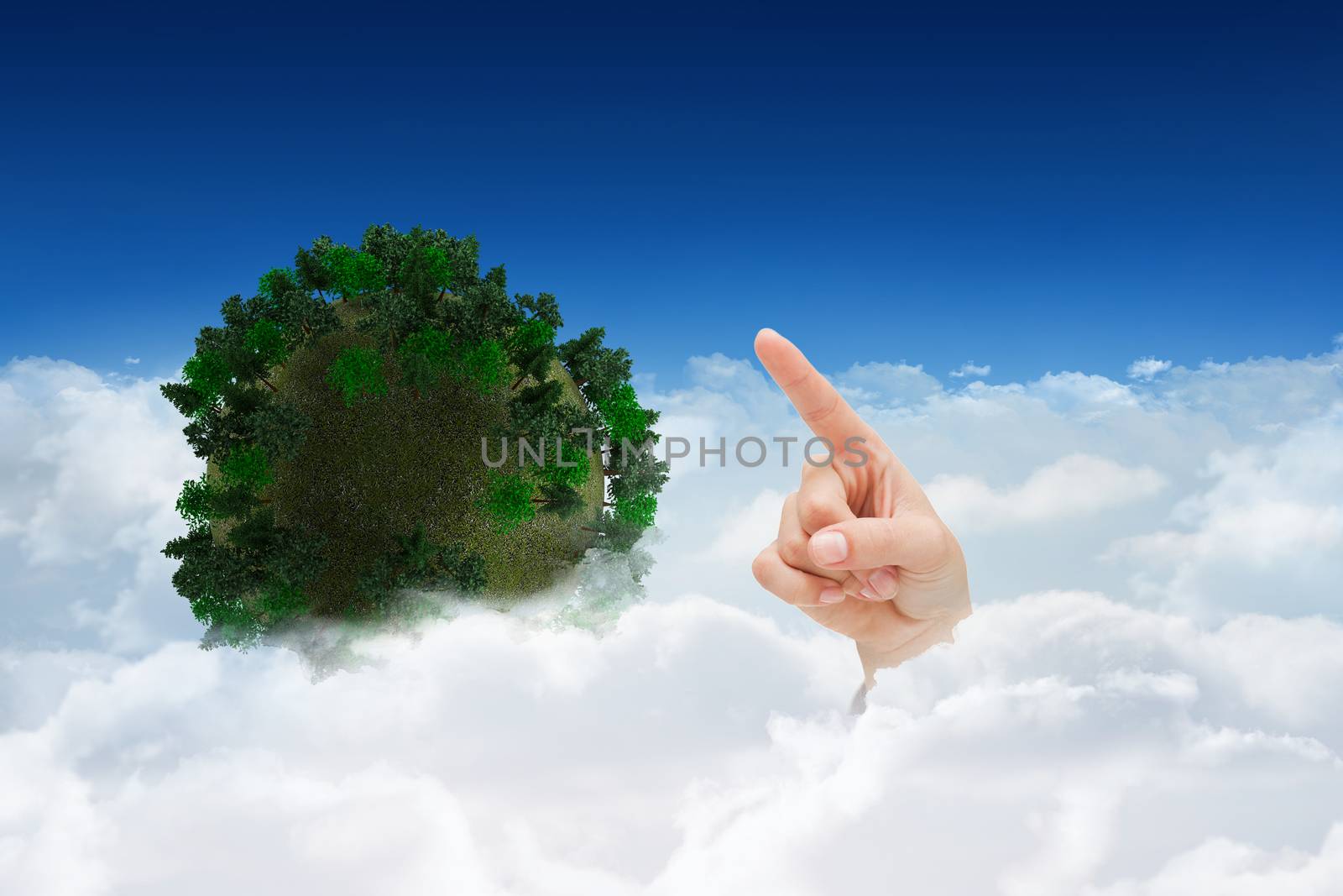 Hand pointing against bright blue sky over clouds